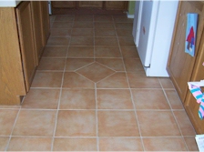 View of Ceramic Tile in a Kitchen after being cleaned in a Residential Home.